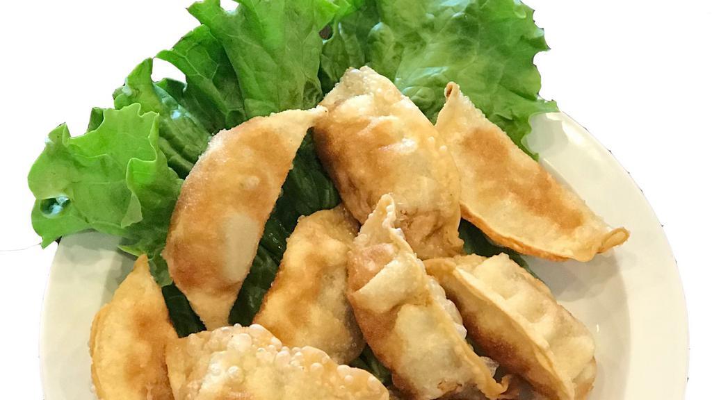 Fried Dumplings (4 Pcs) · Fried pork dumplings served with soy sauce & sesame oil or sweet & sour sauce .