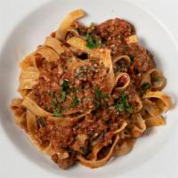 Tagliatelle Bolognese · With braised veal, beef, pork, San Marzano tomatoes.