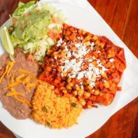 3 Don Taco Enchiladas · Rice, beans, chorizo, and potato on top.