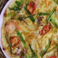 Seafood Pajeon · seafood and scallion pancake, homemade soy dressing