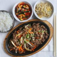 Bulgogi · Thinly Sliced Marinated Beef Ribeye, Carrots, Onions, Rice