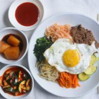 Bibimbob · Rice topped with BEEF, Assorted Vegetables, Sunny Side Up Egg, Gochujang Sauce on the Side

...