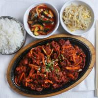 Pork Bulgogi · Spicy, Thinly Sliced Marinated Pork, Onion, Carrots, Rice