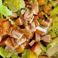 *Grilled Chicken Caesar. · Chopped lettuce, house-made croutons, diced onions, shaved parmesan, grilled chicken breast....