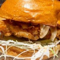 *Chicken Fried Chicken · Made to order country style deep friend chicken, on coleslaw, chopped horseradish pickles & ...
