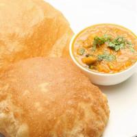 Poori Bhaji · Vegan: Bhaji is a made of Curry made of potato, served with Poori, made with wheat flour.