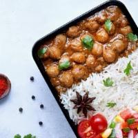 Chole Rice Bowl · Vegan: Chole is a curry based on chickpeas, onions, garlic and other Indian spices. Accompan...