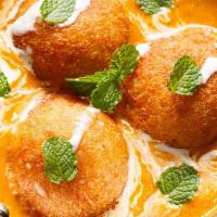 Makhmali Malai Kofta · Allergy warning: Contain milk products and nuts. Vegetables and cheese dumplings served in a...