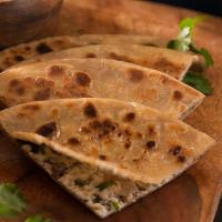 Paneer Paratha · Allergy warning: Contain milk products. Whole wheat bread stuffed with masala Paneer, onion ...