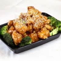 Sesame Chicken · Chicken tossed rapidly over a high flame in our chef’s special sauce w. Sesames.