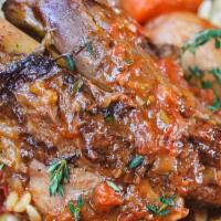 Lamb Shank · Comes with Rice, Salad & Veggies