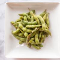 Edamame · Perfectly steamed soybean pods gently tossed with citrus seasoning blend and kosher salt.
