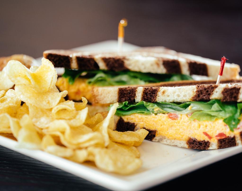 Pimento Cheese · Sharp cheddar cheese, pimentos and mayonnaise.
