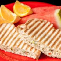 Tuna Melt · White albacore tuna mix, provolone cheese, tabbouleh, and herb vinaigrette toasted on your c...