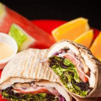 The Birdman · Grilled chicken breast, provolone cheese, mixed greens, tomatoes, and red onions with Dijon ...