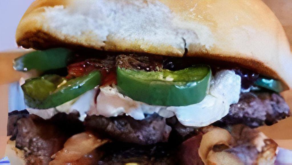 Pb&J Burger · Sourdough Bun with seasoned BEEF/TURKEY grilled Jalapeno Philly Cream Cheese Peanut butter topped with Jelly