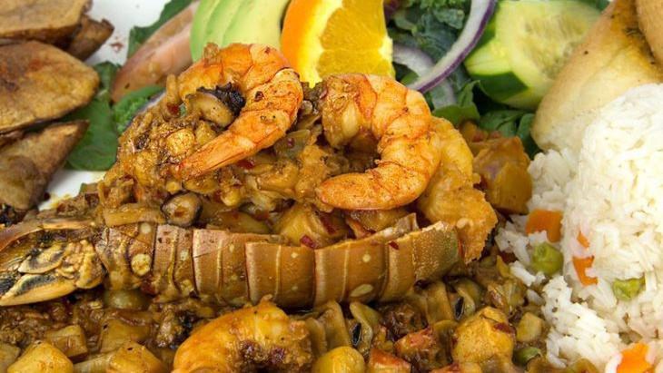 Cola De Langosta Marimar · Lobster tail with a mix of shrimp, octopus, chopped clam, crab. Cooked in our special Nayarit sauce. Served with rice, salad, bread and fresh seasoned slice potatoes. Also available in our mushrooms with cream sauce.