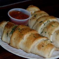 Pizza Joint · Pepperoni and mozzarella rolled into the homemade dough a hint of garlic topped with oregano...