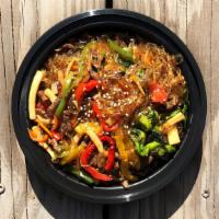 Japchae · Sautéed glass noodles with CAB Beef and assorted vegetables.