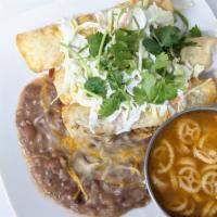 Flautas Plate · 4 flautas with a side of cabbage and crema topped with queso fresco, 1 side of beans, 1 side...