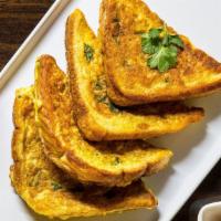 French Toast · Pan fried bread soaked in an omelette batter.