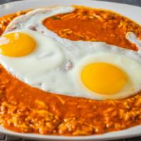 Surti Gotalo · Shredded hard boiled eggs mixed with sunny side up in special 'holic’ spices.