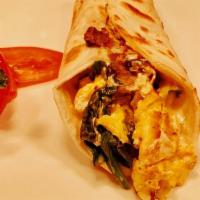 Egg, Mushroom, Spinach And Cheese · Breakfast taco with egg, mushroom, spinach and cheese.