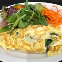 Mushroom · Two eggs with fresh mushrooms, spinach, onion and cheese accompanied by a fresh salad.