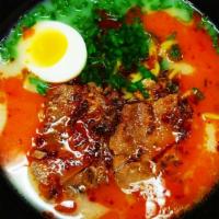 Spicy Tonkatsu Ramen · With 20 hour brewing homemade broth, green onion, chashu(pork meat), boiled egg. Try fantast...