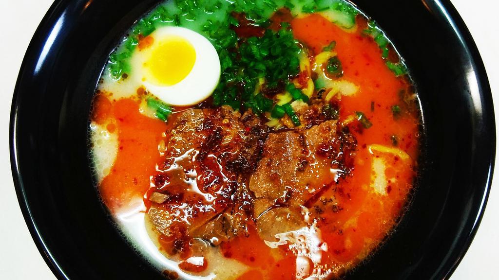 Spicy Tonkatsu Ramen · With 20 hour brewing homemade broth, green onion, chashu(pork meat), boiled egg. Try fantastic our best selling ramen, you will never regret your choice.