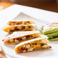 Quesadillas · choice of grilled seasoned chicken or philly meat, sautéed onions, peppers & jalapeño mix, m...