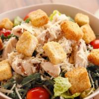 Chicken Caesar · Romaine, chicken, Parmesan, tomatoes and croutons.