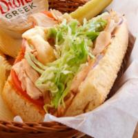 Turkey & Swiss · Red onions tomatoes lettuce mayo deli mustard & served with side pickle spear & homemade gre...