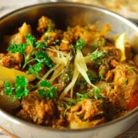 Mutton Do Pyaaza Curry · Slow cooked with caramelized onions. Spicy. Gluten free.