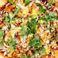 Bbq Chicken Pizza · Texas barbecue sauce, mozzarella and fontinella cheese, roasted chicken, caramelized red oni...