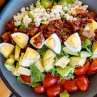 Yes Siree Cobb · Chopped romaine w/blue cheese crumbles, cherry tomatoes, bacon, & fried egg w/honey-bacon-di...