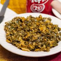 Gomen · Ethiopian stule collard greens cooked with onion, garlic, and spices.