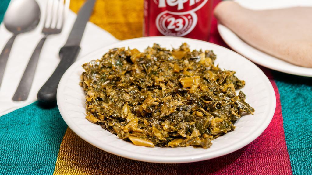 Gomen · Ethiopian stule collard greens cooked with onion, garlic, and spices.
