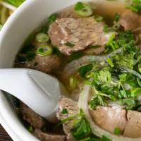 Meat Lover Pho · Rice noodle topped with thinly sliced eye of round, beef meatballs, and brisket in savory be...