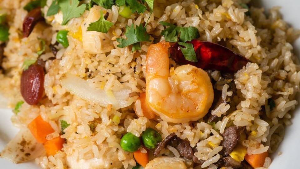 Fried Rice · Your choice of meat with onions, peas and carrots mixed with egg fried rice.