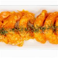 Boom Boom Shrimp · 7 pieces of shrimp fried to perfection then covered in a house spicy aioli. Slightly spicy. ...