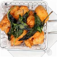 Chicken Nugget Bites · Hand-battered fried chicken bites dusted with salt and white pepper and topped with lightly ...