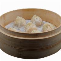 House Soup Dumpling · 6 delicious broth filled dumplings. All made to order with your choice of protein!
