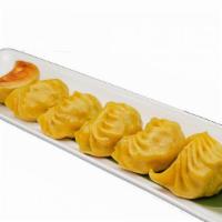 Chicken & Vegetable Dumpling · 6 yellow dumplings filled with chicken and vegetables. It is great for dumpling lovers that ...