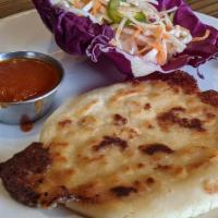 Pupusa Plate · Three pupusas. All pupusas are made with cheese and are served with vinegar infused coleslaw...