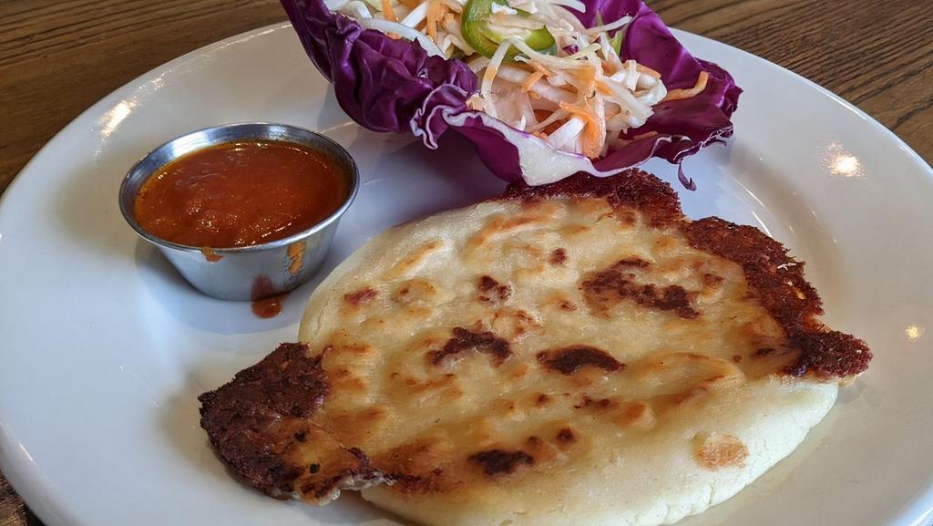Pupusa Plate · Three pupusas. All pupusas are made with cheese and are served with vinegar infused coleslaw known as 