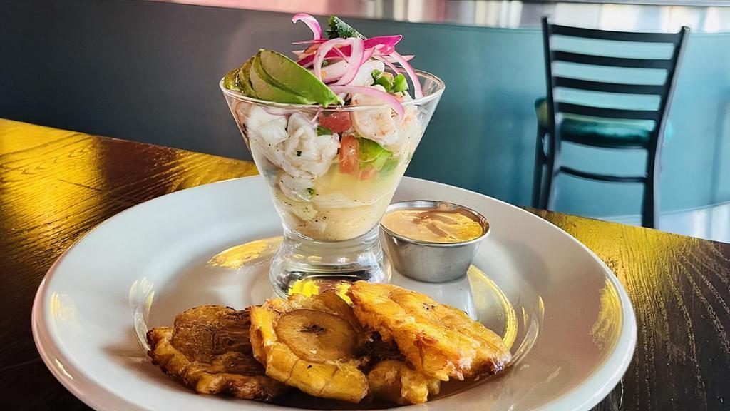 Ceviche De Camarón · Shrimp marinated in lime citrus juices with fresh tomatoes, cilantro, cucumber, serrano peppers, topped with avocado and spicy red onions. Consuming raw or undercooked meats, poultry, seafood, shellfish, or eggs may increase your risk of foodborne illness.