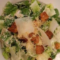 Caesar Salad · romaine heart, parmesan cheese, garlic croutons, lemon parmesan dressing