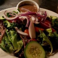 Mamma'S House Salad · mixed Italian greens, cherry tomatoes, red onion, cucumber slices, homemade balsamic dressing