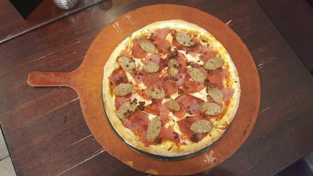 The Meatza · marinara, pepperoni, salami, capicola, pancetta